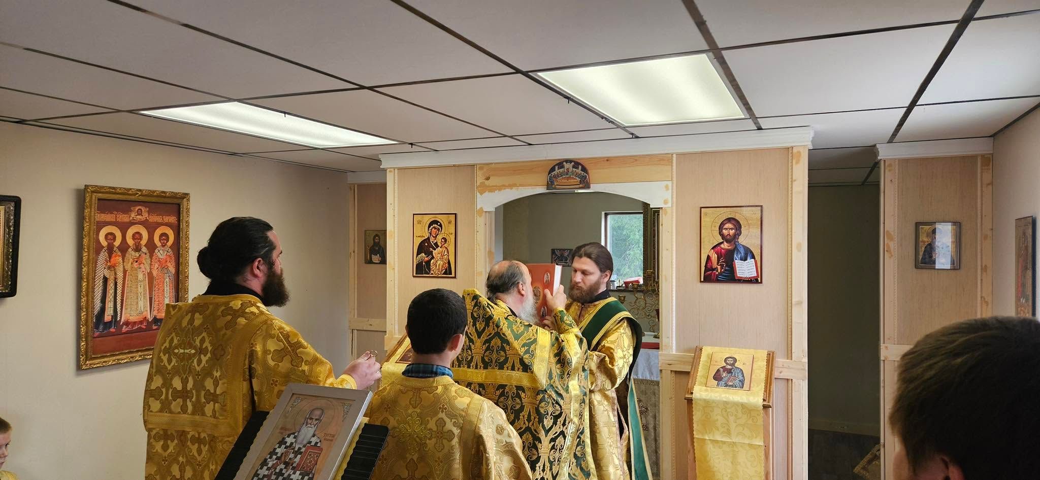 Clergy celebrating the Divine Liturgy at St. Justin Orthodox Church